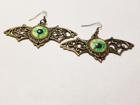 Bronze winged eyes earrings