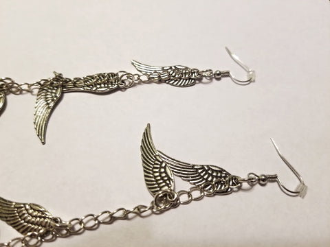 Long silver angel wings earrings