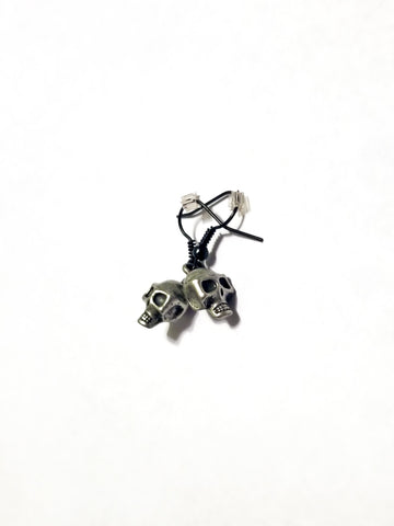 silver skulls with black fishhook earrings